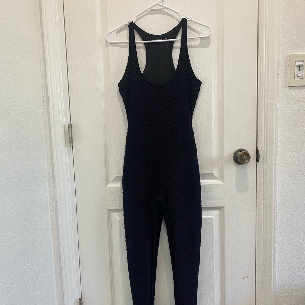 Naked Wardrobe black body suite. Size M